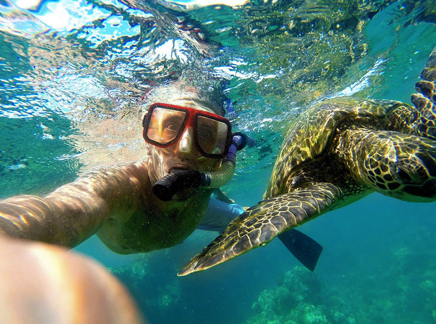 man on snorkel excursion maui hawaii